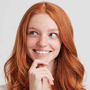 portrait-of-cheerful-pretty-redhead-young-woman